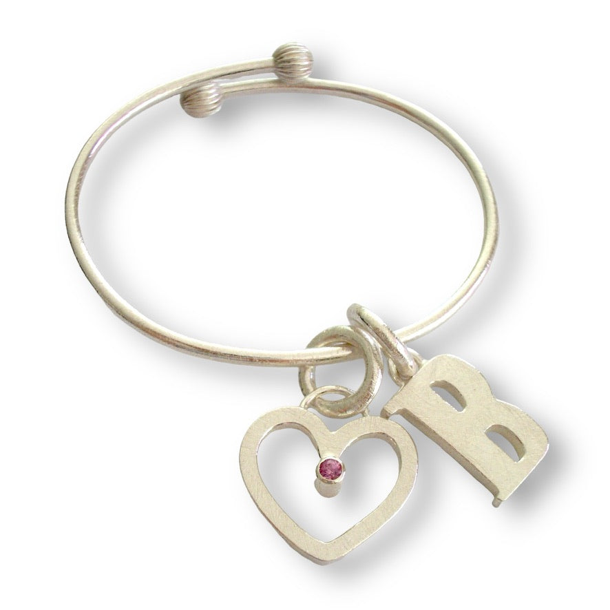 Katherine&#39;s Custom Bespoke B And Heart Baby Charm Bangle For Christening Gift  | In Silver | Set With Pink Sapphire