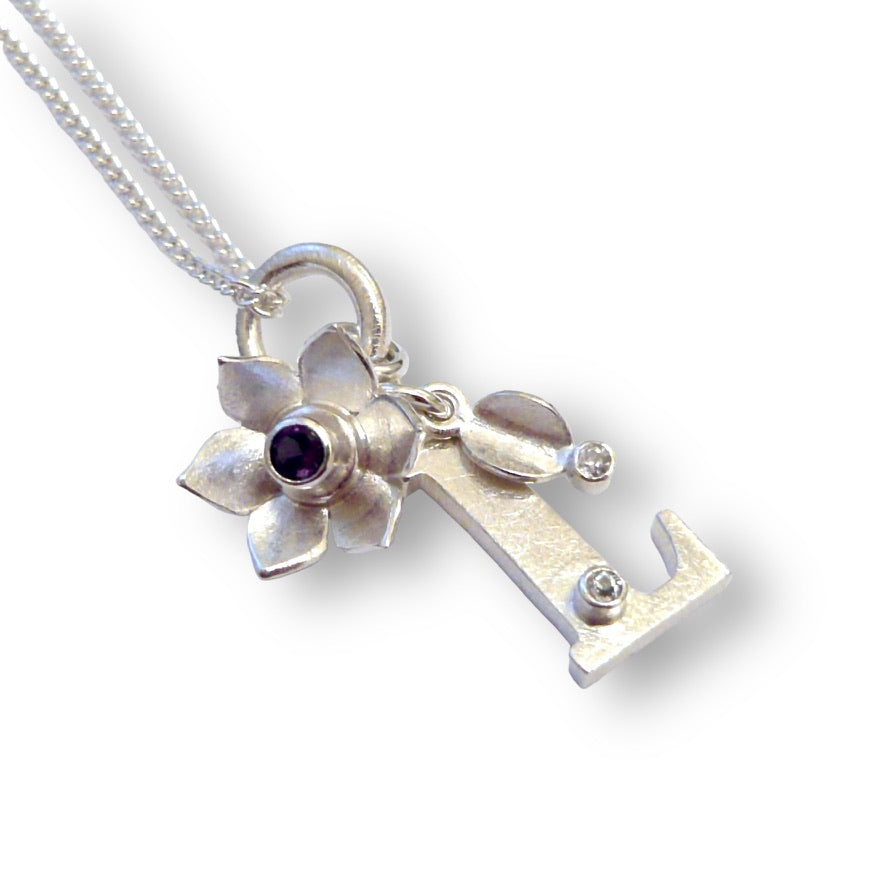 Jane-Mary's Custom Bespoke L, Flower, Leaf And Birthstone Baby Charm Pendant For Christening Gift  | In Silver | Set With Own Diamonds And Amethyst