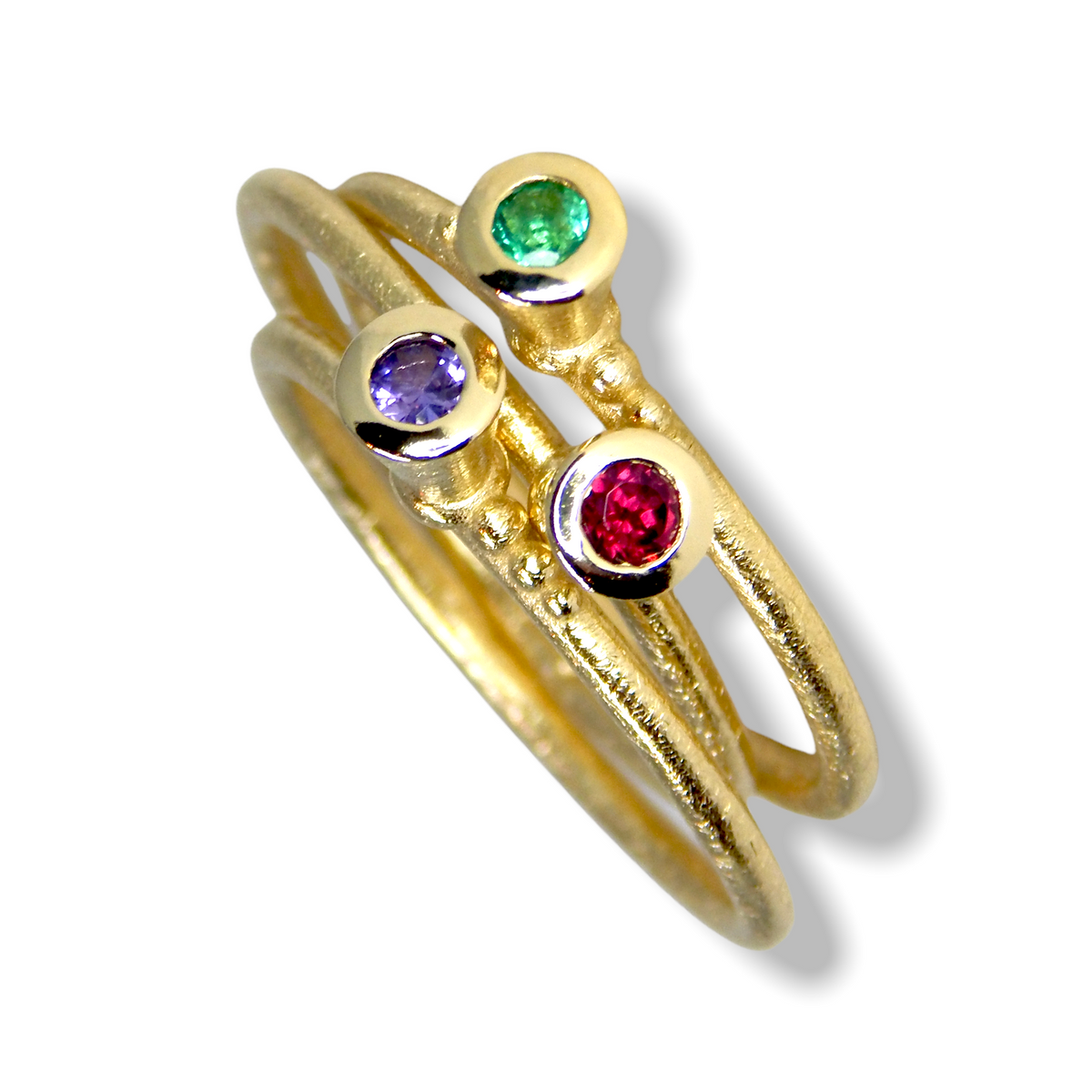 Victoria&#39;s Custom Bespoke Victoria Stacker Ring Set  | In 9ct Yellow Gold | Set With An Emerald, Lilac Sapphire And Rhodolite Garnet
