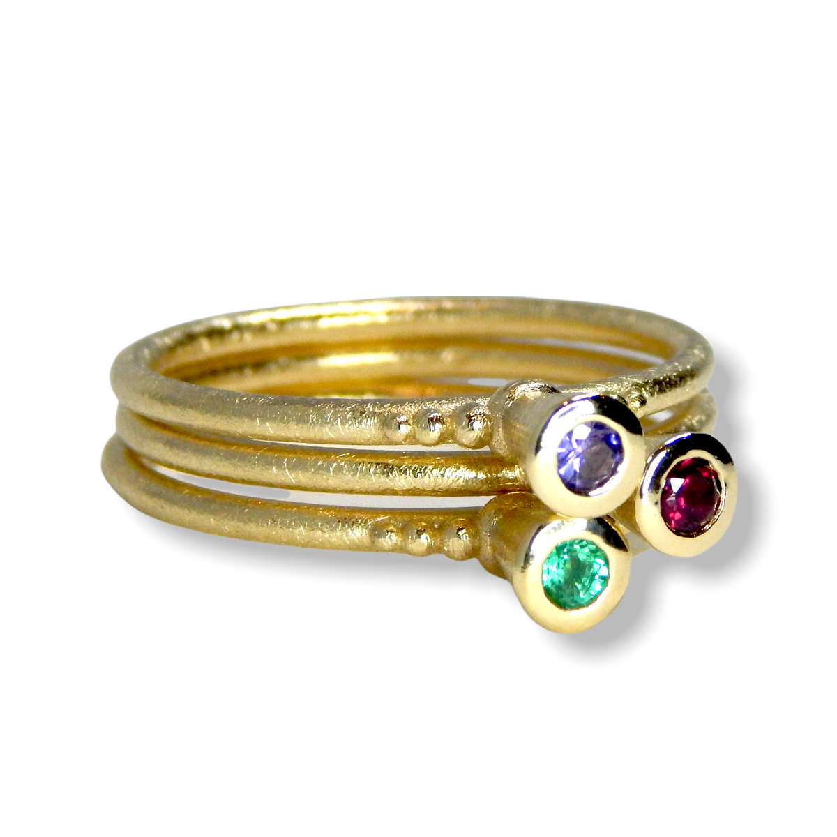 Victoria&#39;s Custom Bespoke Victoria Stacker Ring Set  | In 9ct Yellow Gold | Set With An Emerald, Lilac Sapphire And Rhodolite Garnet